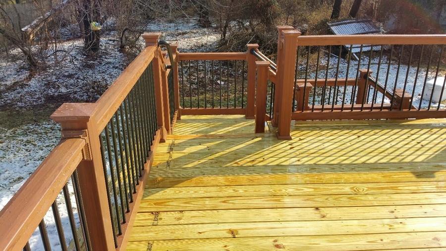 Newly framed cedar deck with railing